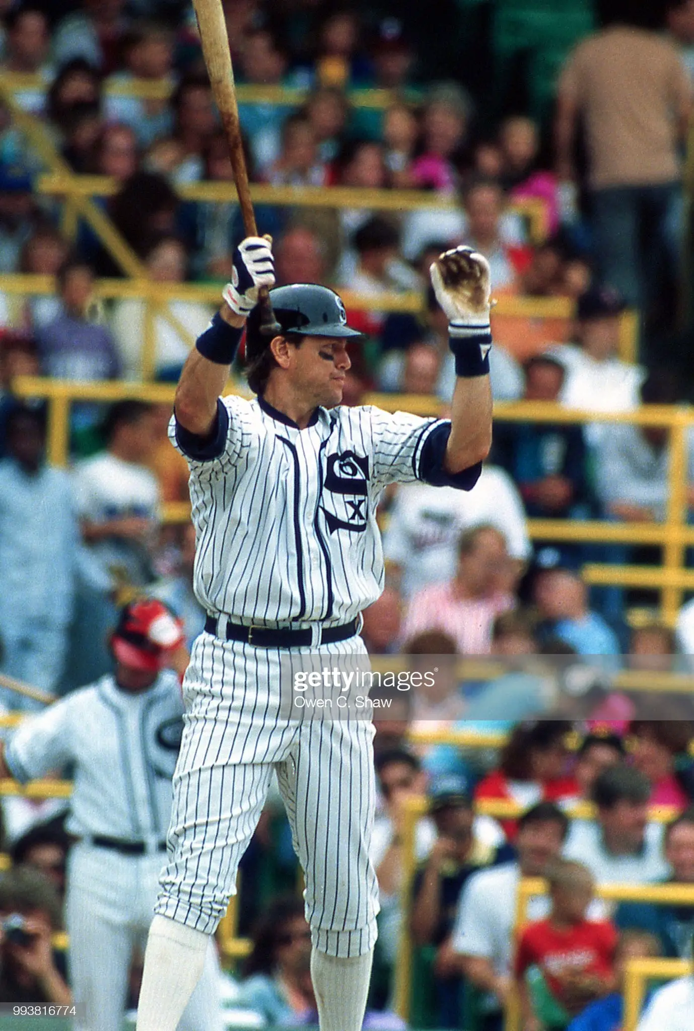 Chicago White Sox catcher, Carlton Fisk, slides into 2nd base wearing  Franklin gloves during a game against the…