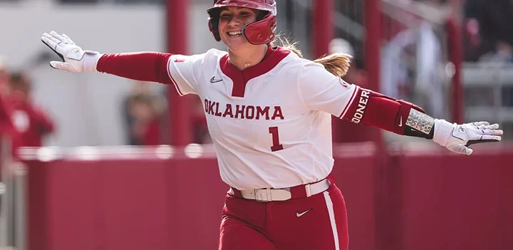 Kendall Wells at the plate in Oklahoma Sooners uniform during her record-setting freshman season